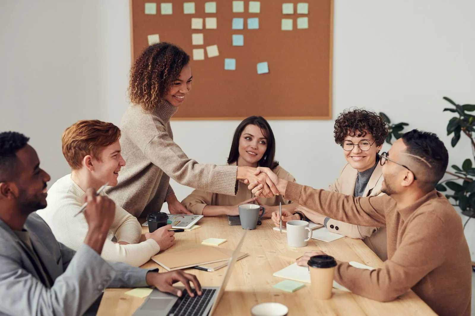 A formal meeting underway in a bright conference room