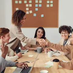 A formal meeting underway in a bright conference room